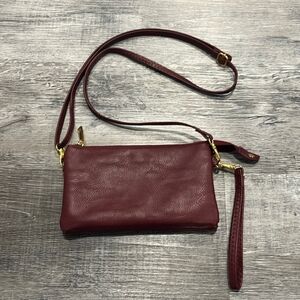 Travel mini crossbody in maroon